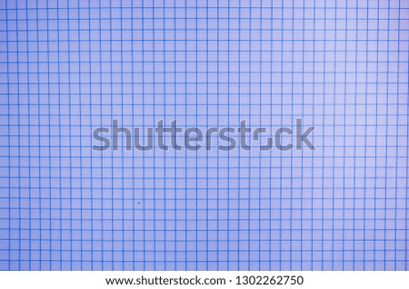 Blank paper sheet of a notebook. Grid. violet. Background