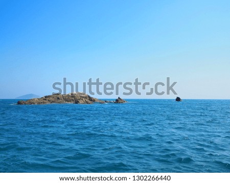 Beautiful scenery of blue Sea and stone island at Sanya, Hainan , China.