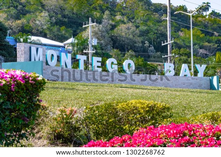The new Montego Bay sign with illuminated lettering at the roundabout on main road outside Sangster International Airport (MBJ). Welcome to Montego Bay 2019.