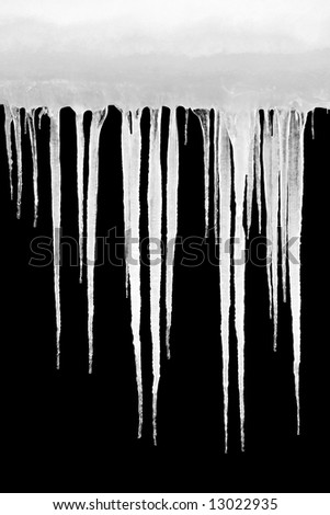icicles shot isolated on solid black, design element Royalty-Free Stock Photo #13022935