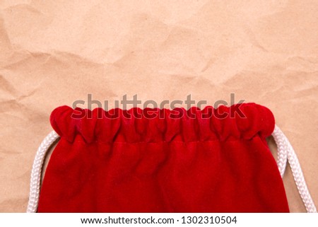 red bag on craft paper background