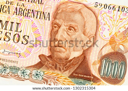 Part of old one thousand pesos Argentina banknote background. High resolution vintage photo of front side argentinian bill, close-up macro.