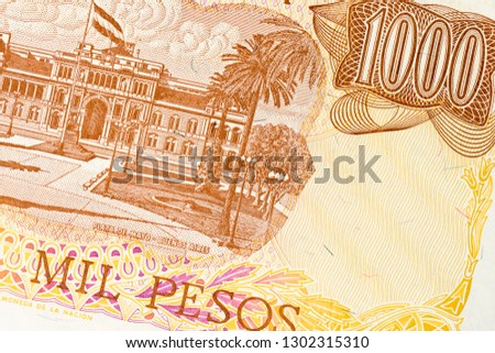 Part of old one thousand pesos Argentina banknote background. High resolution vintage photo of back side argentinian bill, close-up macro.
