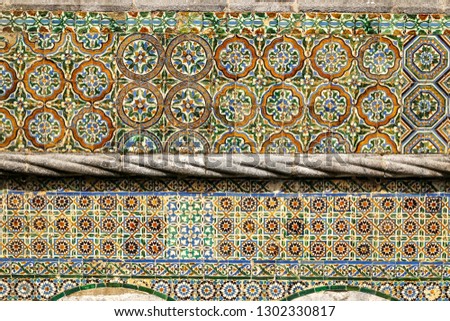 Fragment of ancient ceramic tiles on the wall in the Pena National Palace in Sintra town, Portugal, Europe