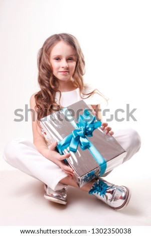 girl holding a gift
