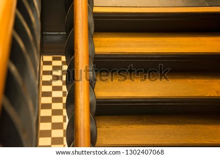 Staircase with checkered tile floor 