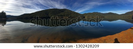 Tranquility Lake William Hovell Royalty-Free Stock Photo #1302428209