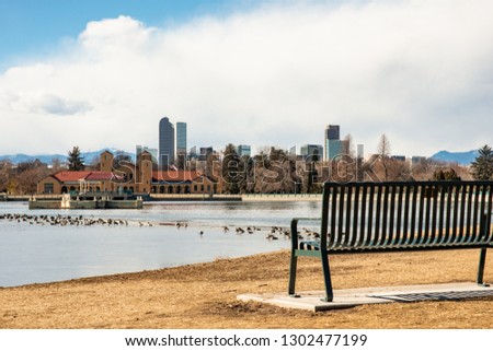 Bench in a park with view over Denver