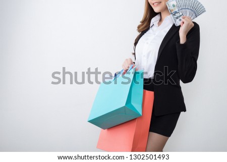 Beautiful  businesswoman with shopping bags - isolated on white background