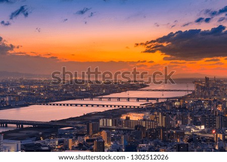Sunset skyline over Umeda city aerial view, Osaka Japan night cityscape