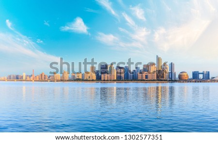 Panoramic city skyline with buildings in Hangzhou at sunrise