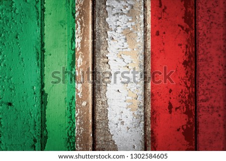 Italian flag on a grunge plank wood texture for decoration or design