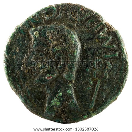 Ancient Roman bronze coin of Emperor Augustus. As. Coined for payment to the veteran legionnaires of Cantabrian Wars. Obverse.