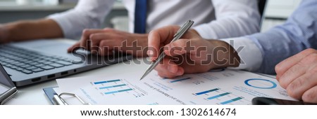 Group of people hold in arms financial papers solve and discuss problem closeup. Fresh view review situation new angle look professional training white collar investment and finance concept Royalty-Free Stock Photo #1302614674
