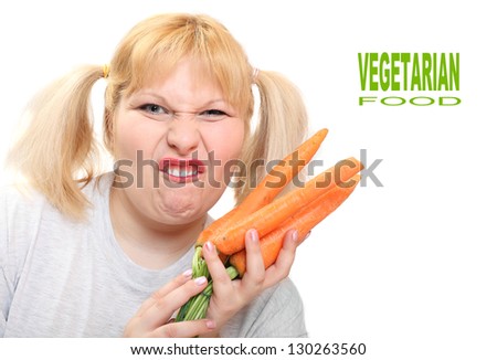 Funny woman with fresh carrot. Picture with space for your text.