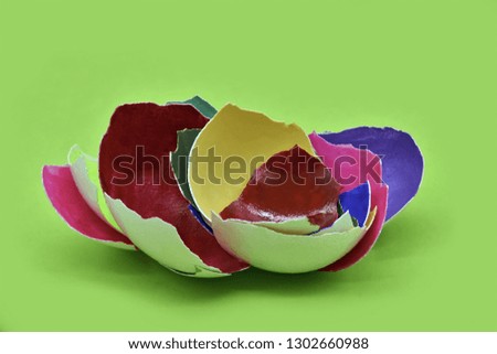 Happy Easter card concept: A multi-colored eggshell.