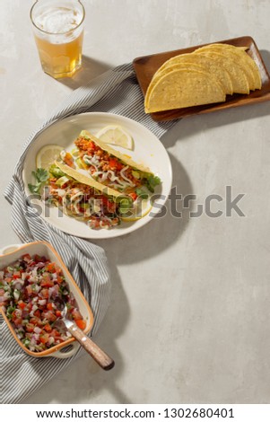 Mexican pork tacos with vegetables. Delicious tacos