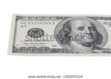 Part of the bill of one hundred American dollars on a white background isolated.