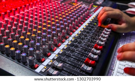 mixing console - dj in action mixing console