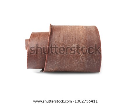 Yummy chocolate curl for decor on white background