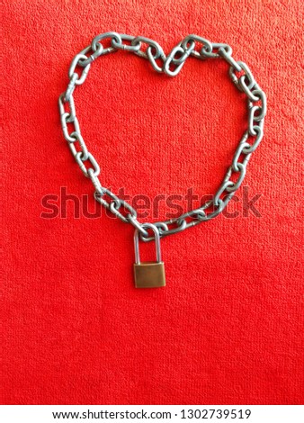 chain lock key heart shape on a red background