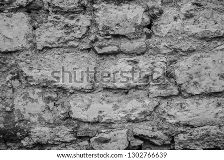 Fragment of stone wall concrete