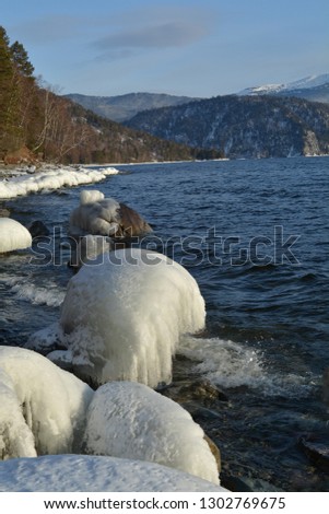 Coast of Teletskoye Lake in winter