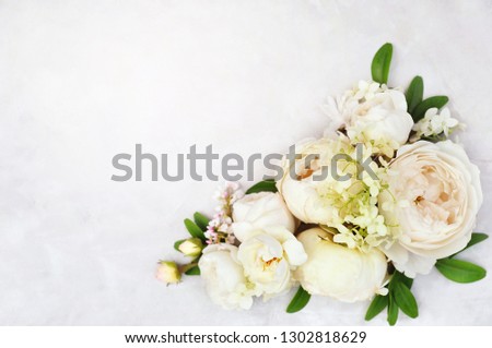 Summer blossoming delicate rose on blooming flowers festive background, pastel and soft bouquet floral card, selective focus, toned	
