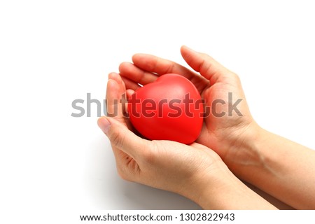 red heart in hands