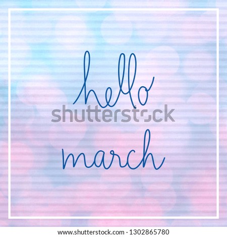 Hello March lettering with bokeh light on blue and pink corrugated paper.