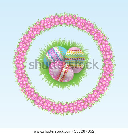 easter eggs with garland of spring flowers