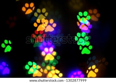 colorful bokeh in the shape of animal tracks