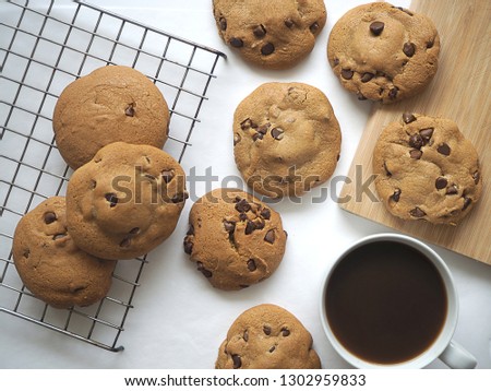 Cookies arranged with inner chocolate nutella melt. Stylized chocolate chips cookies.