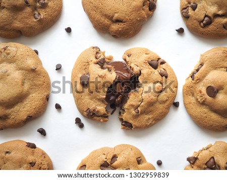 Cookies arranged with inner chocolate nutella melt. Stylized chocolate chips cookies.