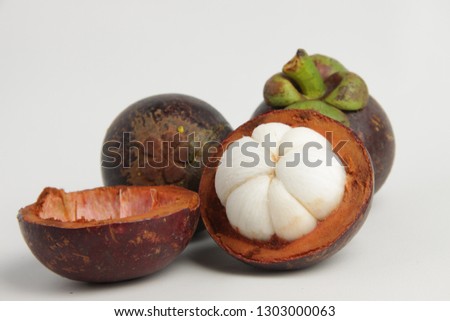 Picture of Garcinia mangostana on a white isolated background