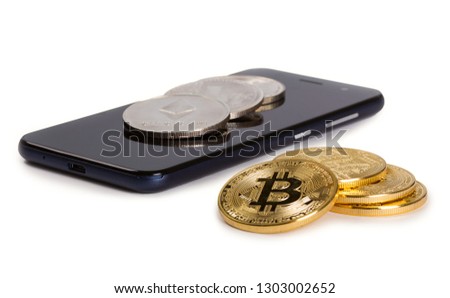 Cryptocurrency coins and smartphone isolated on white background