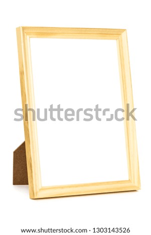 Standing wooden picture frame isolated on white background with clipping path