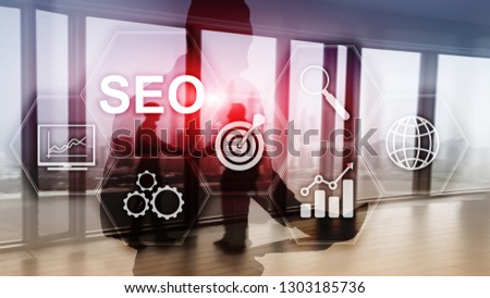 SEO - Search engine optimization, Digital marketing and internet technology concept on blurred background.