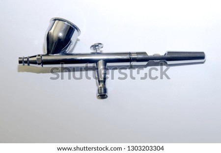 Airbrush on a white background. Isolated object. Artistic theme.