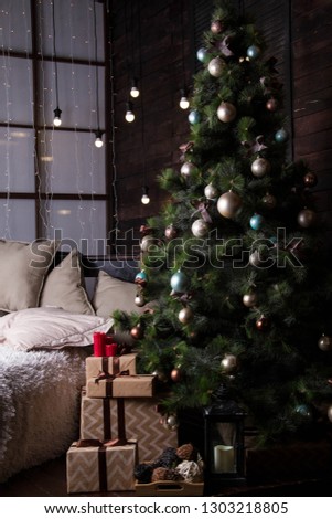 Fir-tree and New Year's scenery in a photo studio