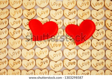 Natural wooden hearts with an inscription love