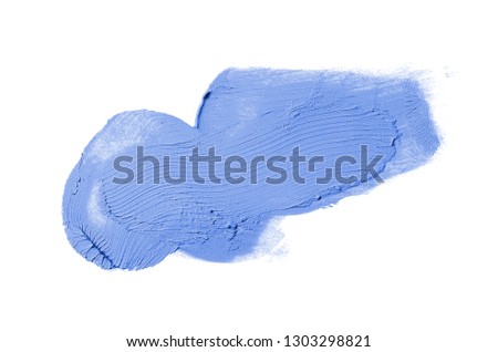 Smear and texture of lipstick or acrylic paint isolated on white background. Stroke of lipgloss or liquid nail polish swatch smudge sample. Element for beauty cosmetic design. Blue color