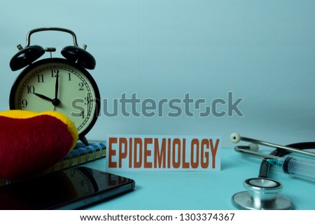Epidemiology Planning on Background of Working Table with Office Supplies. Medical and Healthcare Concept Planning on White Background