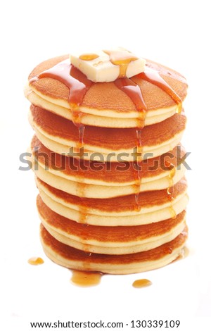 stack of pancakes isolated on white background Royalty-Free Stock Photo #130339109