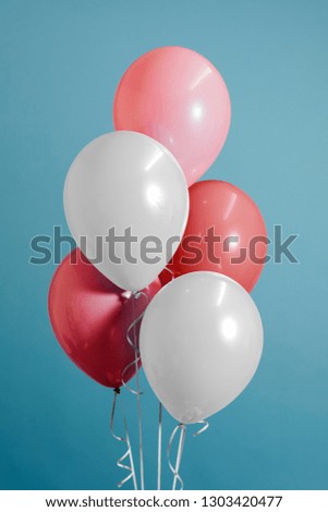 White and pastel pink balloons