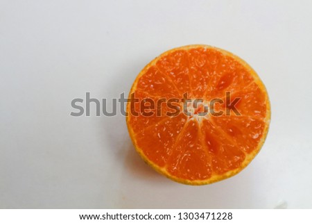 selective focus of slice orange on white background