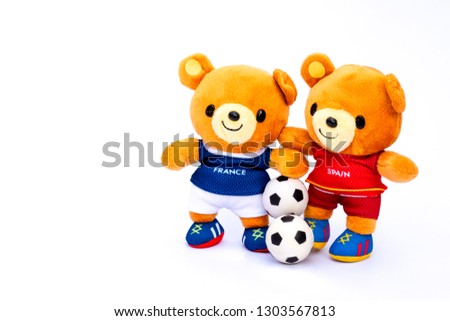 Teddy bear athlete France and Spain players with ball isolated on white background.
