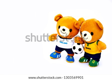 Teddy bear athlete England and  Brazil players with ball isolated on white background.