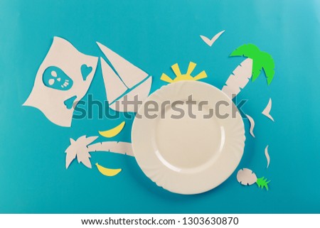 pirate ship concept image. paper cut on blue background