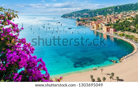 French Riviera coast with medieval town Villefranche sur Mer, Nice region, France Royalty-Free Stock Photo #1303695049